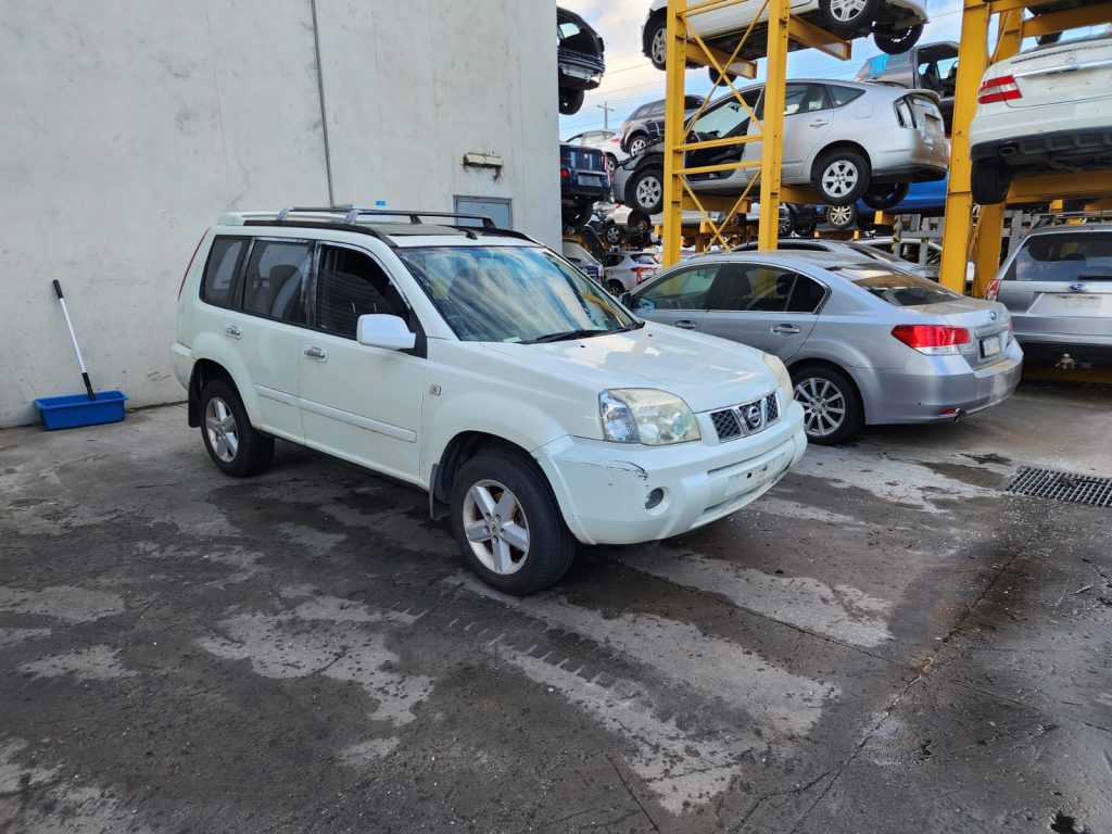 Cash for Scrap Cars The Patch VIC 1 White SUV beside other cars in a vehicle yard